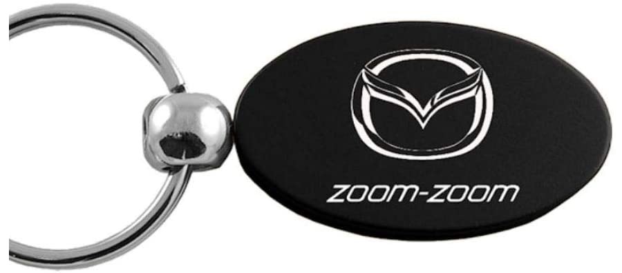 Logo Mazda dengan Tagline Zoom-zoom